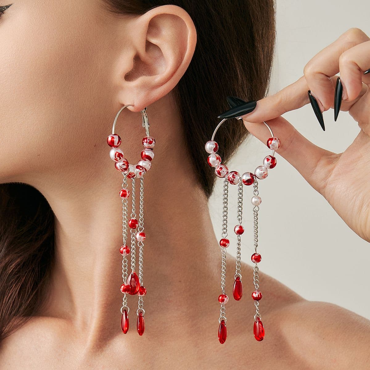12 White K Earrings